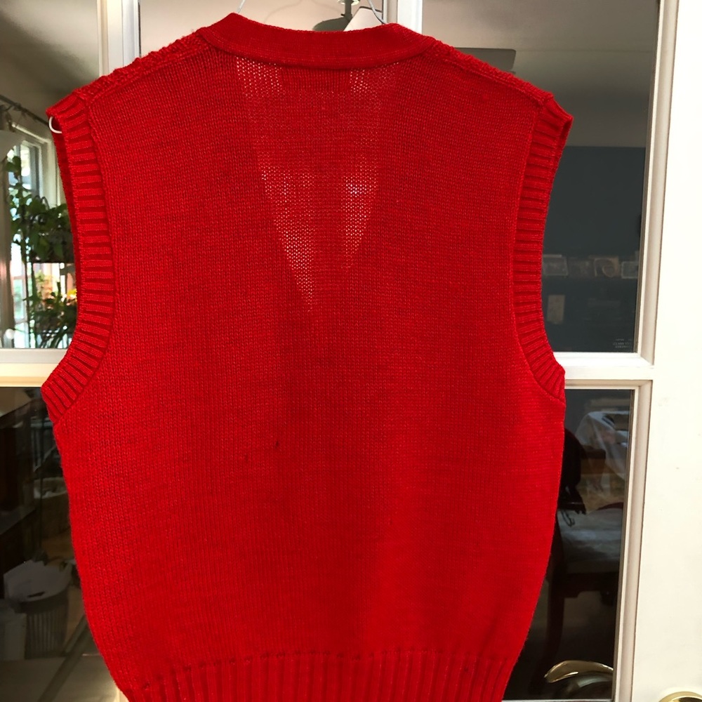 Red pure Pendleton wool vest.  Tiny hole in back.  Not to be noticed